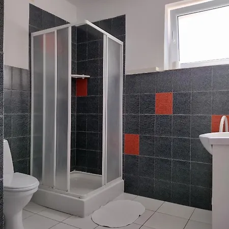 Δωμάτια σε οικογενειακή κατοικία Satori *